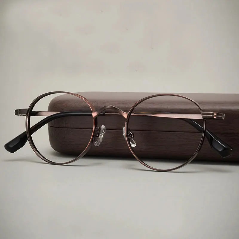 Unisex Oval Full Rim Titanium Prescription Glasses 310521 — view 1 | Rx Spectacle