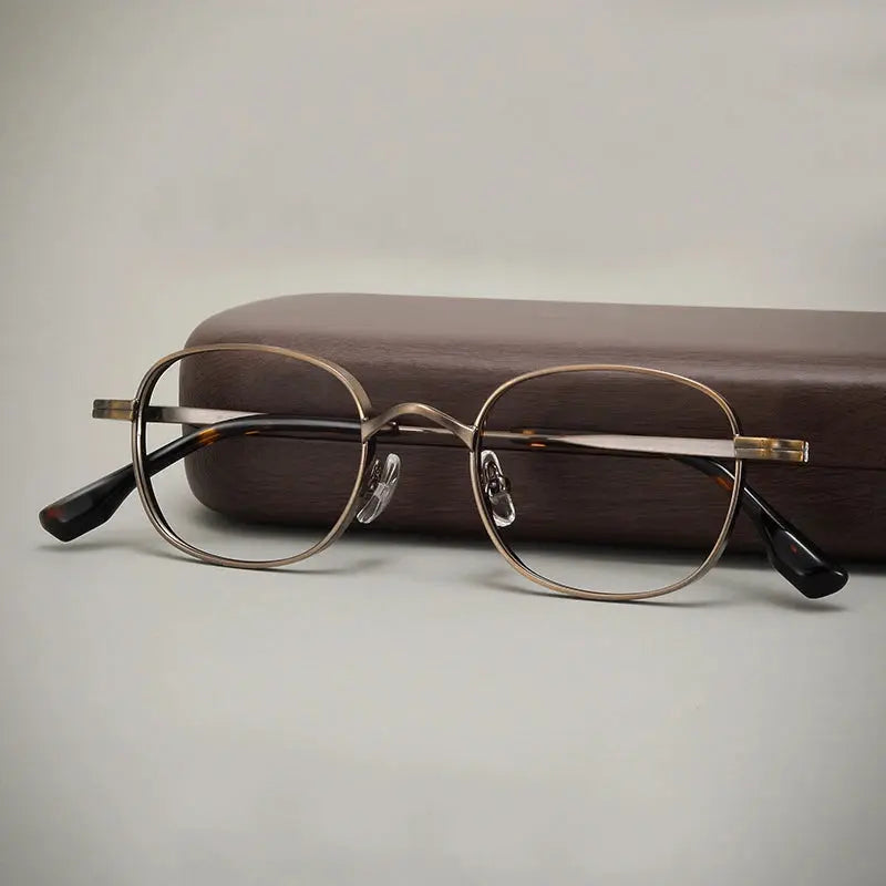 Unisex Oval Full Rim Titanium Prescription Glasses 310520 — view 1 | Rx Spectacle