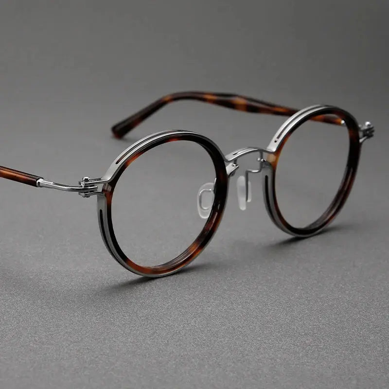 Unisex Round Full Rim Titanium Oversized Prescription Glasses 635862 — view 1 | Rx Spectacle