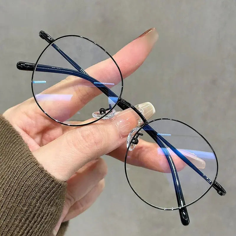 Women's Oval Full Rim Titanium Prescription Glasses 90265 — view 5 | Rx Spectacle