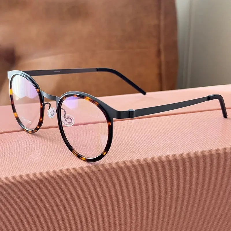 Women's Round Full Rim Titanium Prescription Glasses 199704 — view 1 | Rx Spectacle