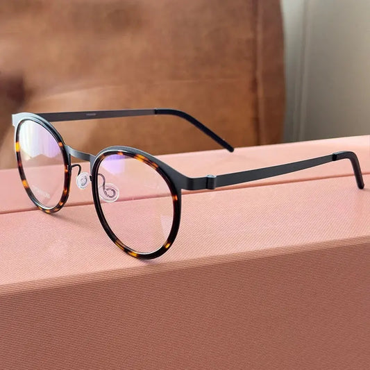 Women's Round Full Rim Titanium Prescription Glasses 199704 — view 1 | Rx Spectacle