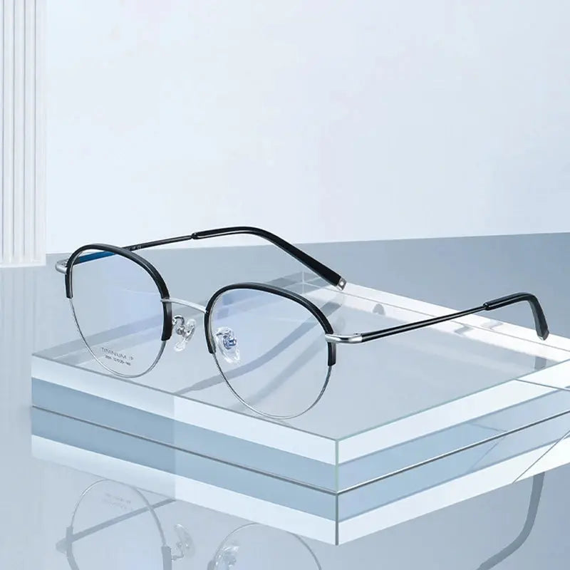 Women's Oval Full Rim Titanium Prescription Glasses 52039 — view 1 | Rx Spectacle