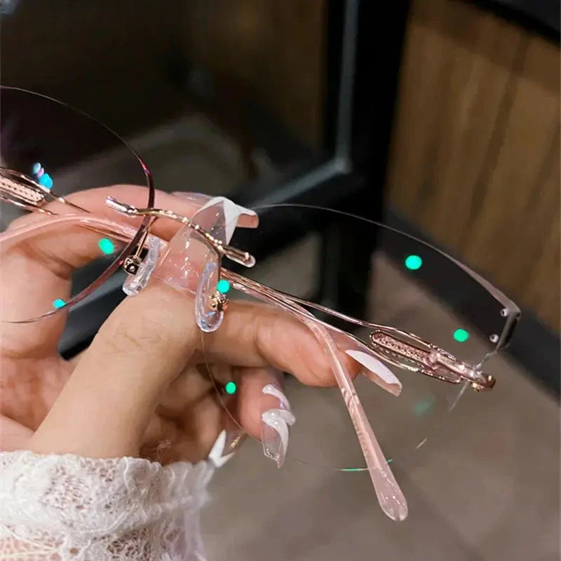 Women's Cat Eye Rimless Titanium Prescription Glasses 001 — view 3 | Rx Spectacle