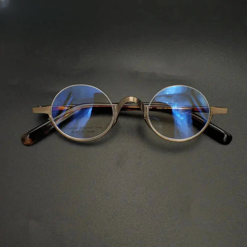 Unisex Oval Semi-Rimless Titanium Prescription Glasses 13838 — view 1 | Rx Spectacle