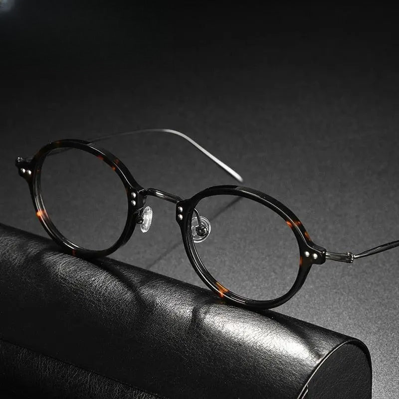 Unisex Round Full Rim Titanium Prescription Glasses Gxyj546 — view 1 | Rx Spectacle