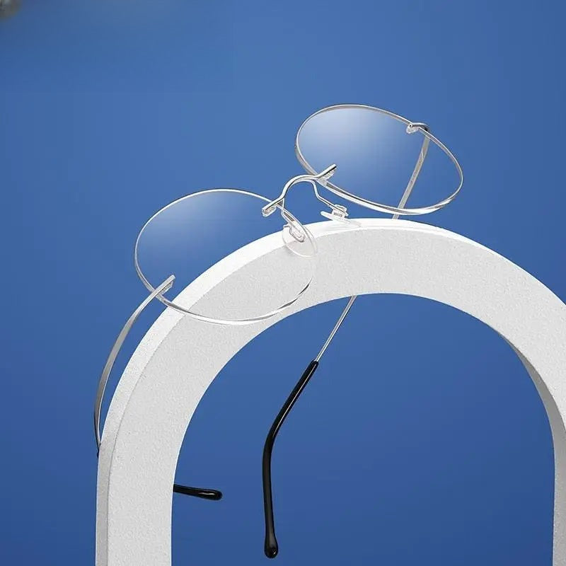 Unisex Round Rimless Titanium Prescription Glasses 6074 — view 4 | Rx Spectacle