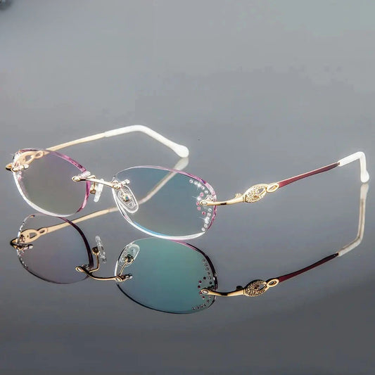 Women's Oval Rimless Titanium Prescription Glasses 30894 — view 1 | Rx Spectacle