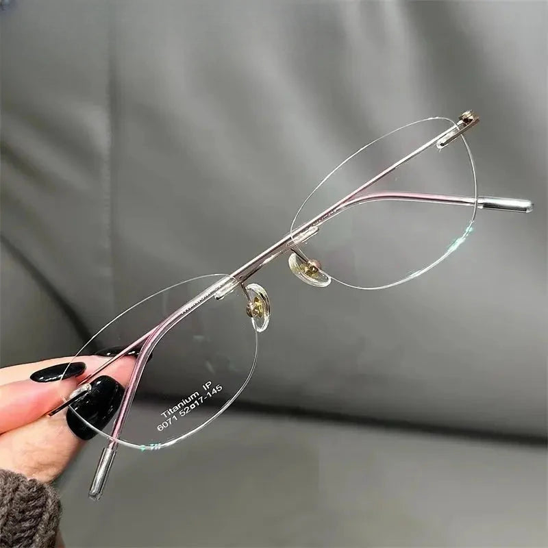 Women's Oval Rimless Titanium Prescription Glasses 696071 — view 1 | Rx Spectacle