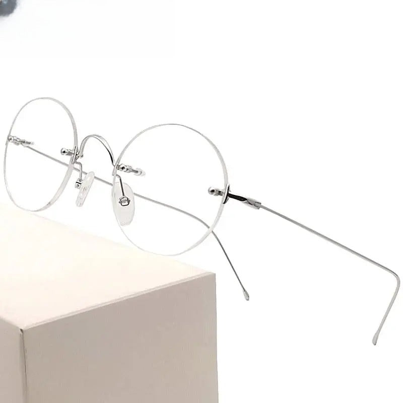 Women's Round Rimless Titanium Prescription Glasses Kr8635 — view 1 | Rx Spectacle