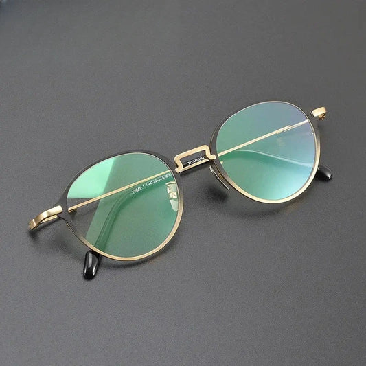 Unisex Round Full Rim Titanium Prescription Glasses 360046 — view 1 | Rx Spectacle