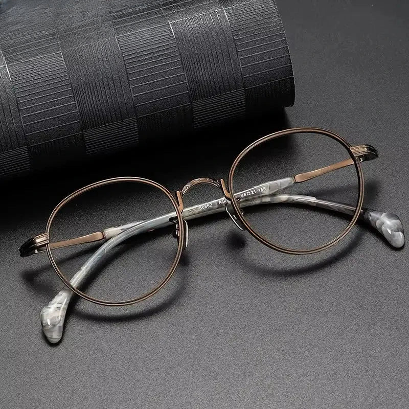 Women's Round Full Rim Titanium Prescription Glasses 80862 — view 1 | Rx Spectacle