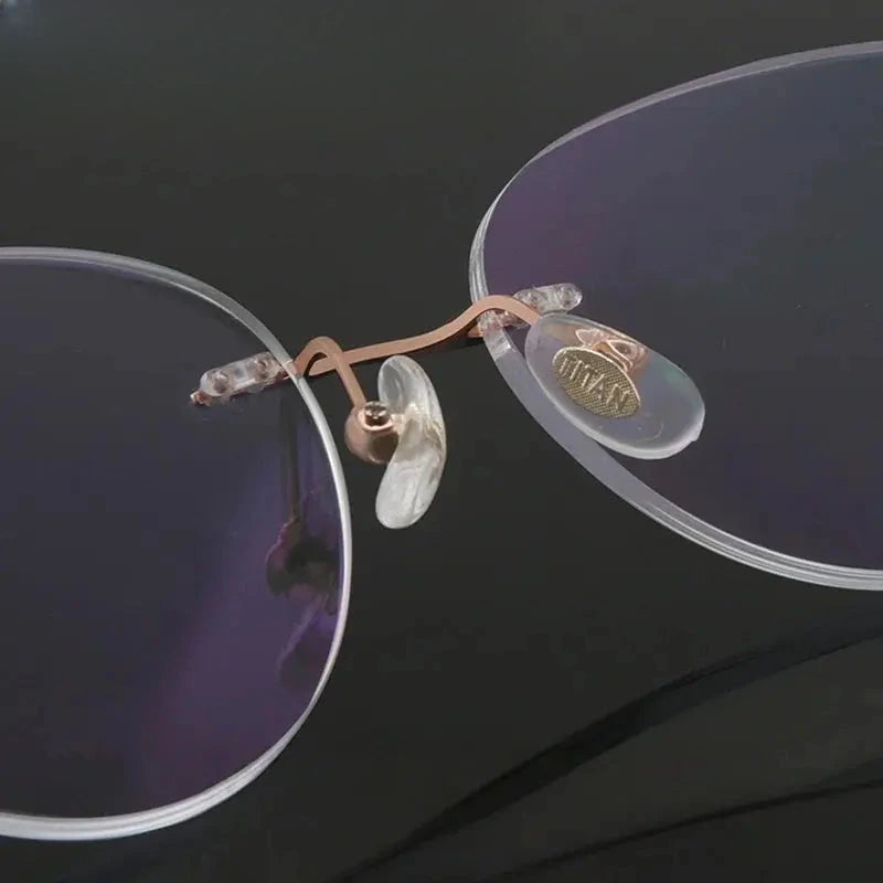 Women's Cat Eye Rimless Titanium Prescription Glasses 694218 — view 5 | Rx Spectacle