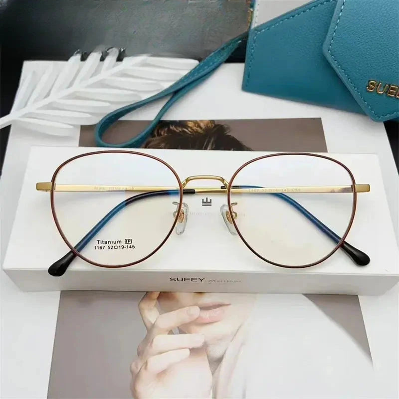 Unisex Oval Full Rim Titanium Prescription Glasses 611167 — view 8 | Rx Spectacle