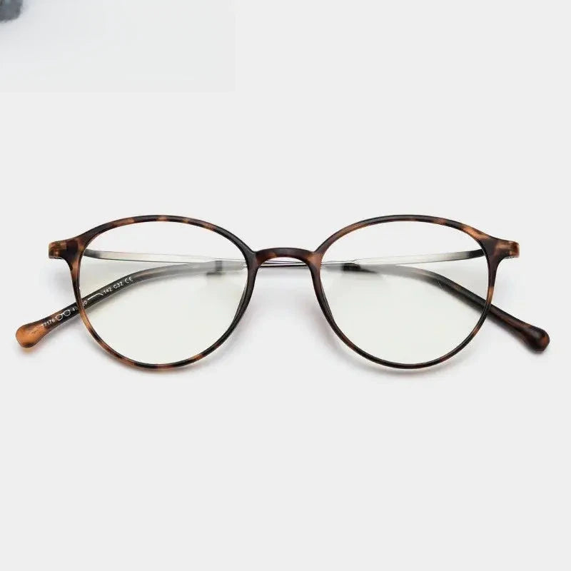 Women's Round Full Rim Titanium Prescription Glasses 71764 — view 1 | Rx Spectacle