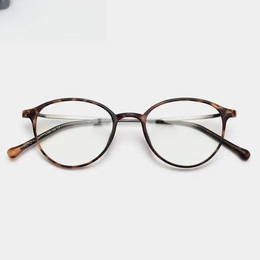 Women's Round Full Rim Titanium Prescription Glasses 71764 — view 1 | Rx Spectacle