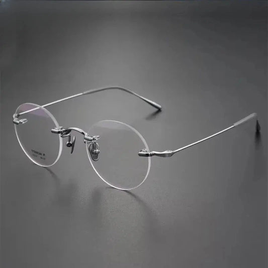 Women's Round Rimless Titanium Prescription Glasses 882323 — view 1 | Rx Spectacle