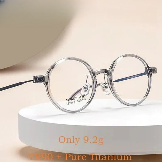 Unisex Round Full Rim Titanium Prescription Glasses 16101x — view 1 | Rx Spectacle