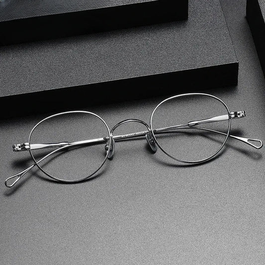 Unisex Oval Full Rim Titanium Prescription Glasses M002 — view 1 | Rx Spectacle