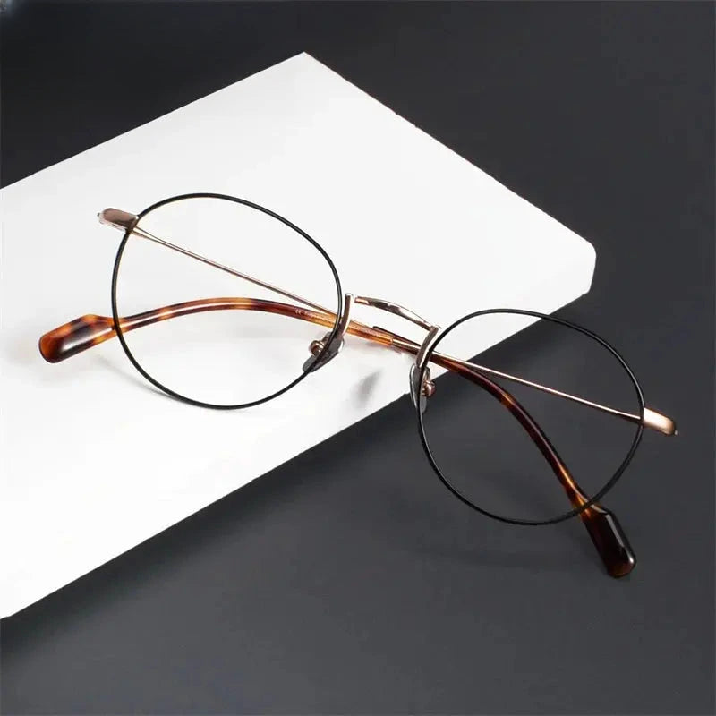 Women's Oval Full Rim Titanium Prescription Glasses 939141 — view 1 | Rx Spectacle