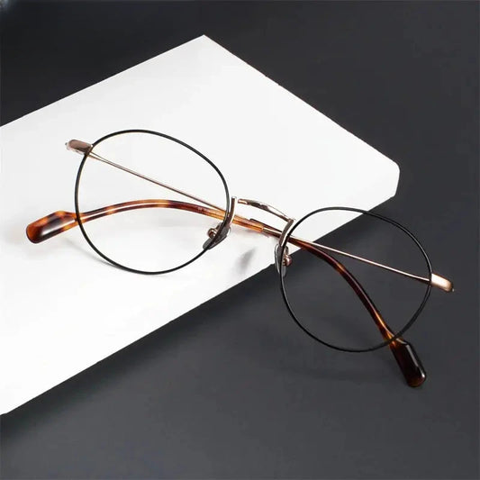 Women's Oval Full Rim Titanium Prescription Glasses 939141 — view 1 | Rx Spectacle