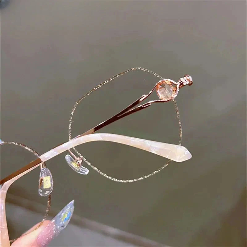Women's Round Rimless Titanium Flat Top Prescription Glasses 88301 — view 5 | Rx Spectacle