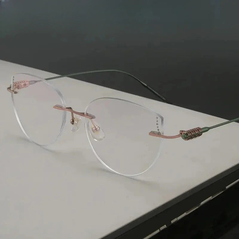 Women's Cat Eye Rimless Titanium Prescription Glasses 694218 — view 1 | Rx Spectacle