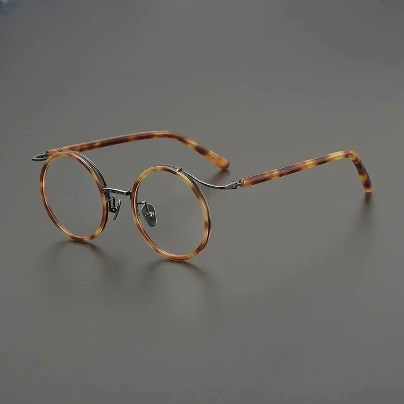 Unisex Round Full Rim Titanium Prescription Glasses G85676 — view 1 | Rx Spectacle