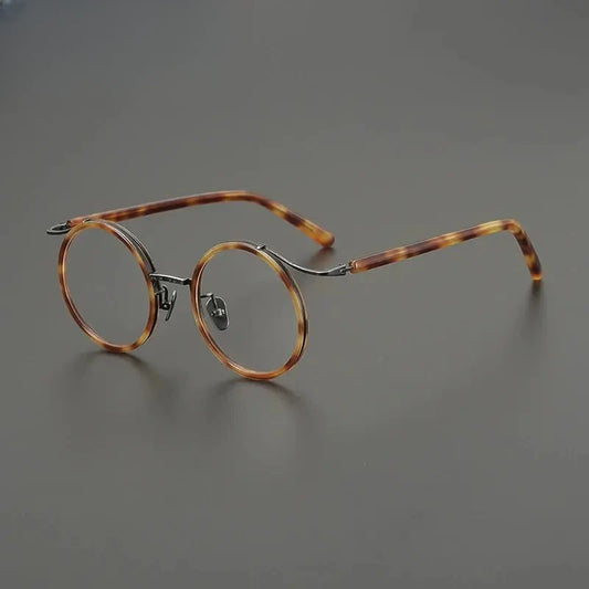 Unisex Round Full Rim Titanium Prescription Glasses G85676 — view 1 | Rx Spectacle