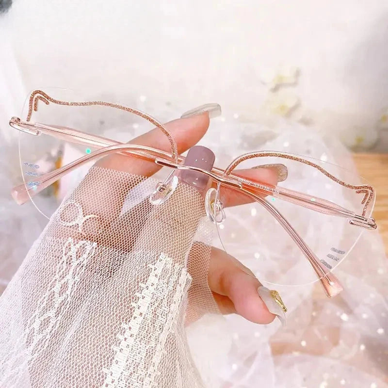 Women's Cat Eye Rimless Titanium Prescription Glasses 88582 — view 1 | Rx Spectacle