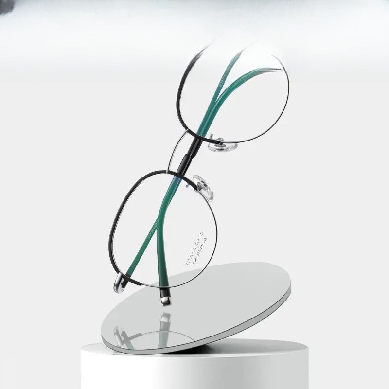 Unisex Oval Semi-Rimless Titanium Prescription Glasses 662039 — view 1 | Rx Spectacle