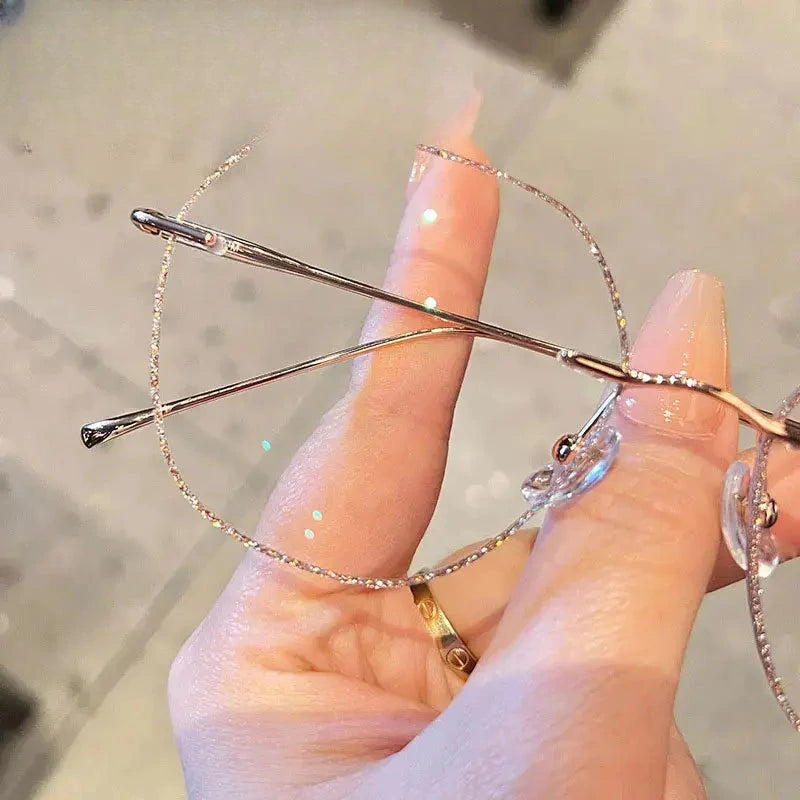 Women's Oval Rimless Alloy Prescription Glasses 89251 — view 1 | Rx Spectacle