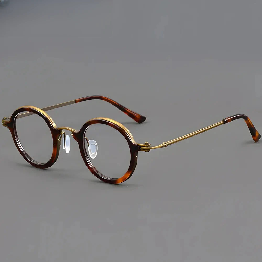 Women's Round Full Rim Titanium Prescription Glasses 75899 — view 1 | Rx Spectacle