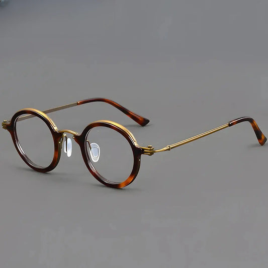 Women's Round Full Rim Titanium Prescription Glasses 75899 — view 1 | Rx Spectacle