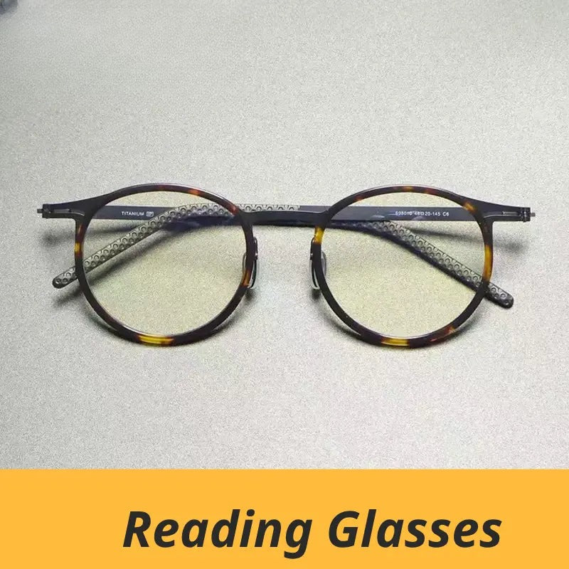 Unisex Round Full Rim Titanium Reading Glasses G698010 — view 1 | Rx Spectacle