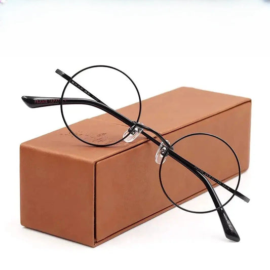 Women's Round Full Rim Titanium Prescription Glasses 43100 — view 1 | Rx Spectacle
