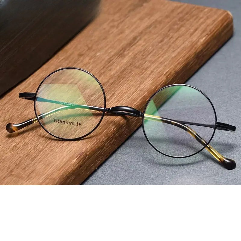 Women's Round Full Rim Titanium Prescription Glasses 520132 — view 1 | Rx Spectacle
