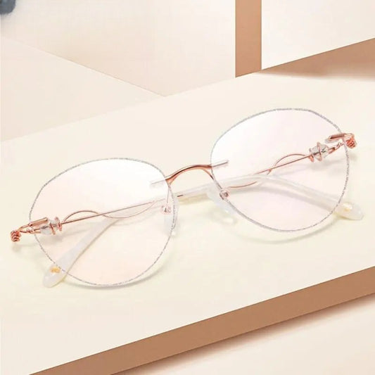 Women's Round Rimless Titanium Prescription Glasses 88128 — view 1 | Rx Spectacle