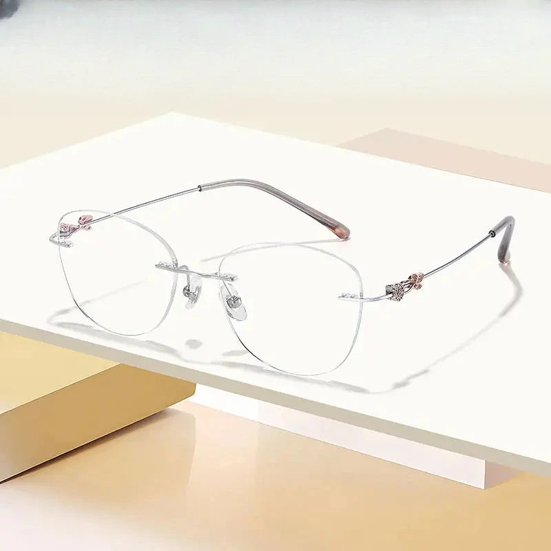 Women's Cat Eye Rimless Titanium Prescription Glasses 60864 — view 1 | Rx Spectacle