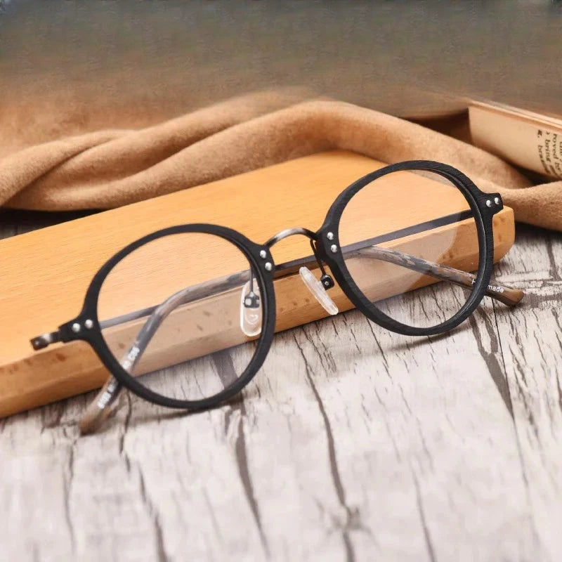 Women's Round Full Rim Titanium Prescription Glasses 810300 — view 1 | Rx Spectacle