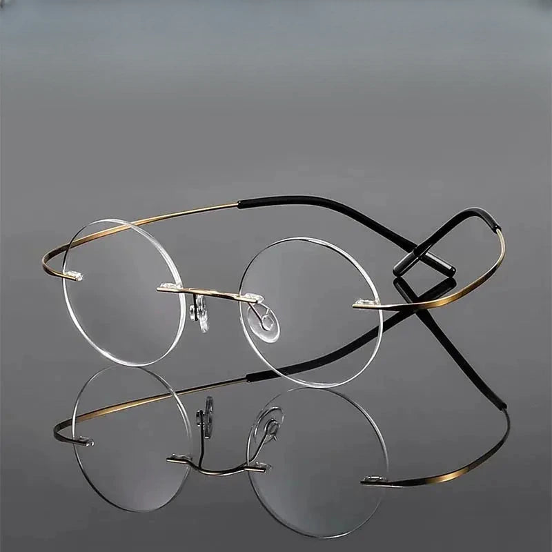 Women's Round Rimless Titanium Prescription Glasses 034000 — view 1 | Rx Spectacle