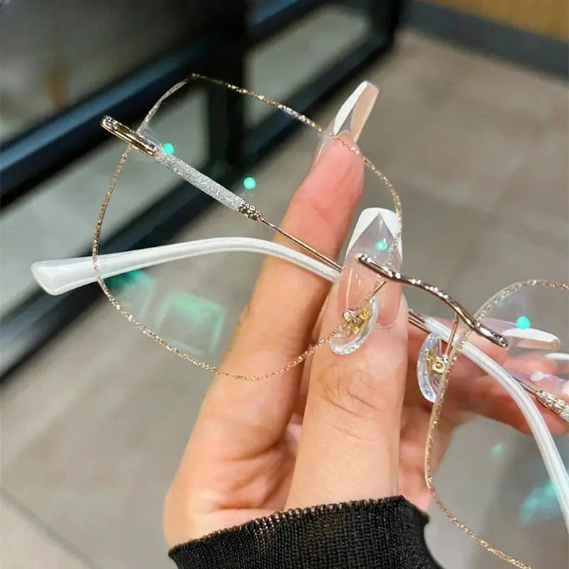 Women's Polygon Rimless Titanium Prescription Glasses 112399 — view 1 | Rx Spectacle