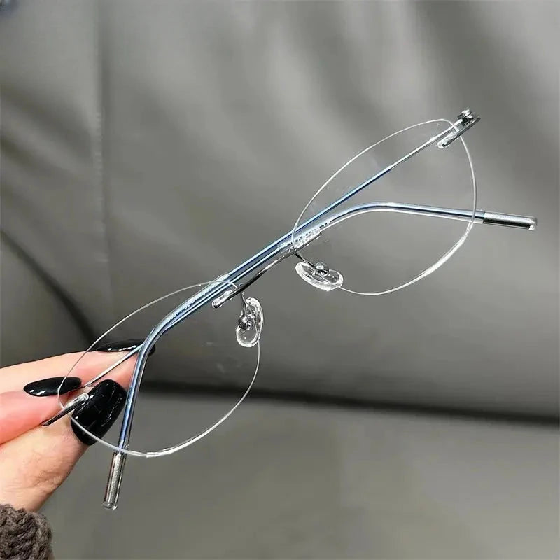 Women's Cat Eye Rimless Titanium Prescription Glasses 666071 — view 5 | Rx Spectacle