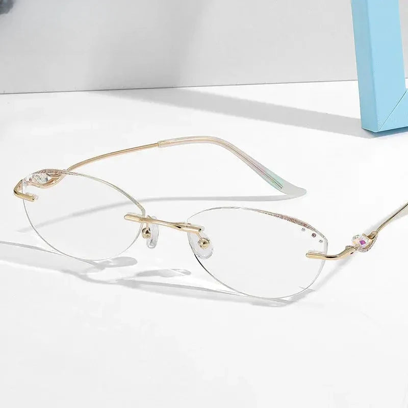 Women's Oval Rimless Titanium Prescription Glasses 352053 — view 1 | Rx Spectacle