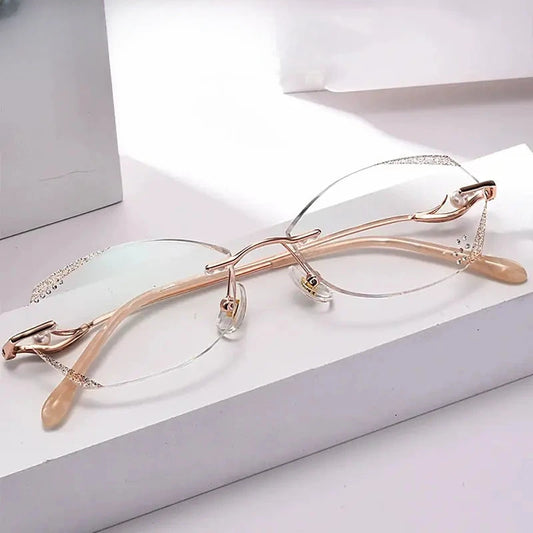 Women's Oval Rimless Titanium Prescription Glasses 88831 — view 1 | Rx Spectacle
