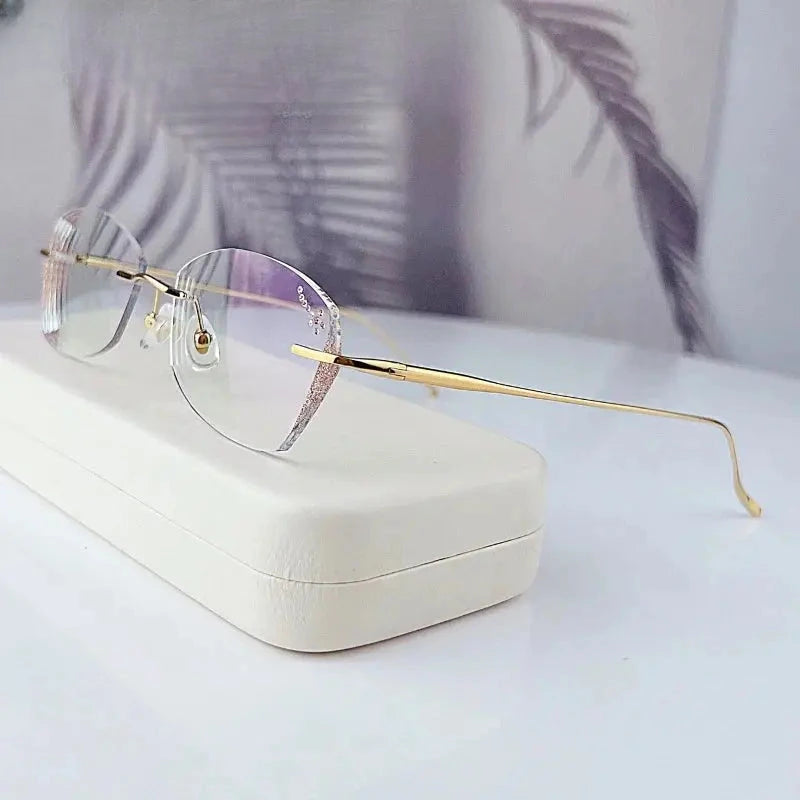 Women's Oval Rimless Titanium Prescription Glasses 698989 — view 1 | Rx Spectacle