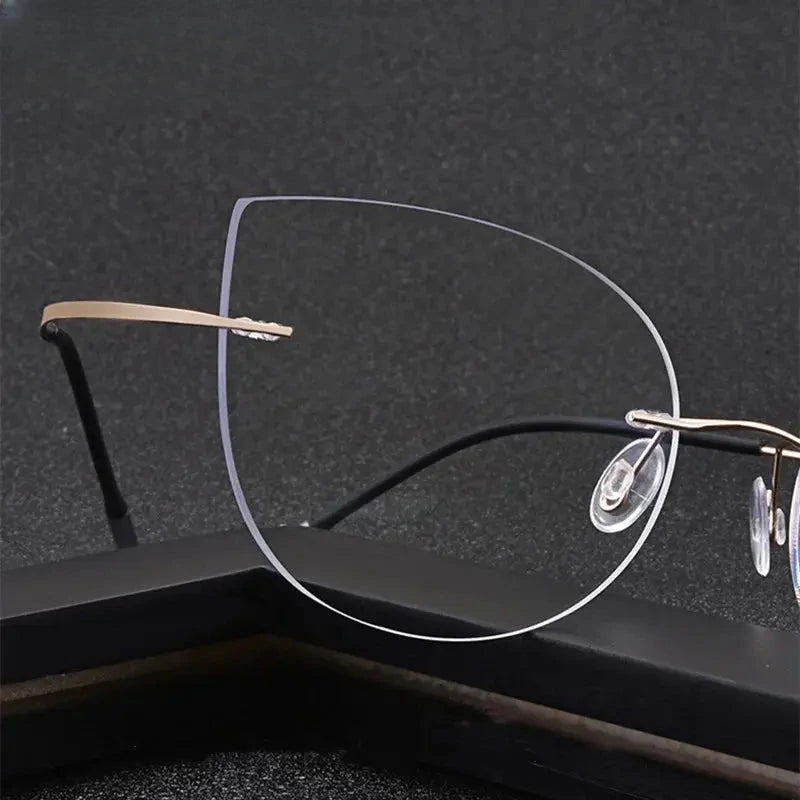 Unisex Cat Eye Rimless Titanium Prescription Glasses 003 — view 2 | Rx Spectacle