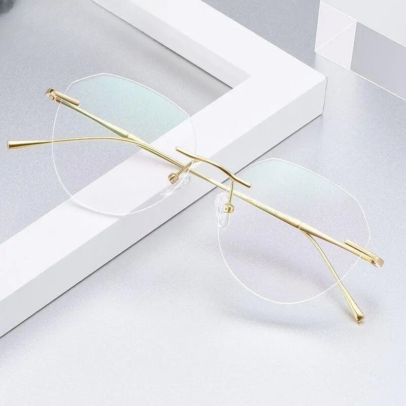 Women's Round Rimless Titanium Prescription Glasses 3018 — view 1 | Rx Spectacle