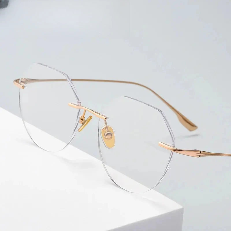 Women's Oval Rimless Titanium Flat Top Prescription Glasses 113636 — view 1 | Rx Spectacle
