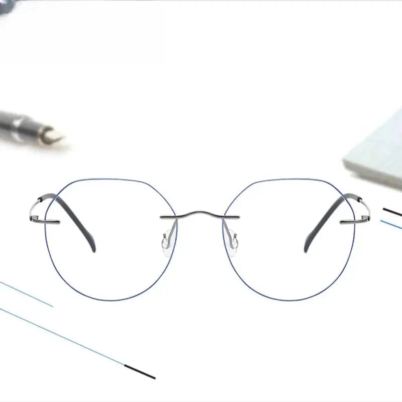 Women's Round Rimless Titanium Flat Top Prescription Glasses 778408 — view 1 | Rx Spectacle